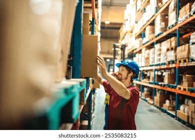 Warehouse worker organizing boxes on shelves - Powered by Shutterstock