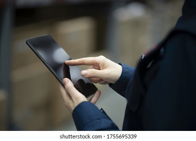 Warehouse worker using digital tablet in logistics warehouse 