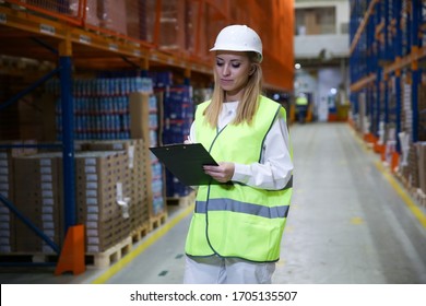 Warehouse Worker Woman Safety Vests Holding Stock Photo 1483221143 ...