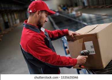 Warehouse worker working on a conveyor line