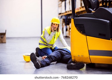 Warehouse workers after an accident in a warehouse.