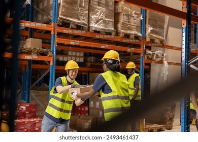 Warehouse workers with disabilities collaborating to move boxes, highlighting inclusion and teamwork. - Powered by Shutterstock