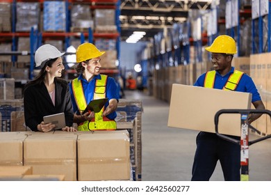 warehouse, workers are engaged in a discussion while employee prepares to lift a box. Active environment focused on logistics and teamwork.