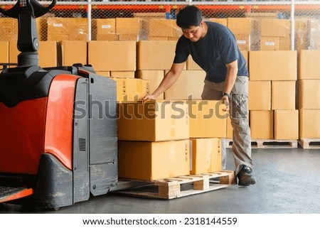 Warehouse Workers Lifting Package Boxes Stack on Pallet. Cartons, Cardboard Boxes. Supply Chain, Shipment Boxes, Shipping Supplies Warehouse Logistic	

