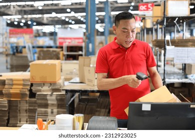 Warehouse workers man using computer, walkie talkie radio and cardboard for controlling stock and payment in retail warehouse logistics, distribution center