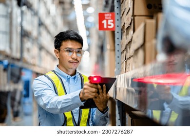 Warehouse workers use scanner checking and scan the barcode of stock inventory to keep storage in a system, Smart warehouse management system, Supply chain and logistic network technology concept.