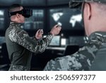 Warfare pilot using head-mounted displays VR glasses, digital device operating with robot, drone or troops of mechanical soldiers. The military