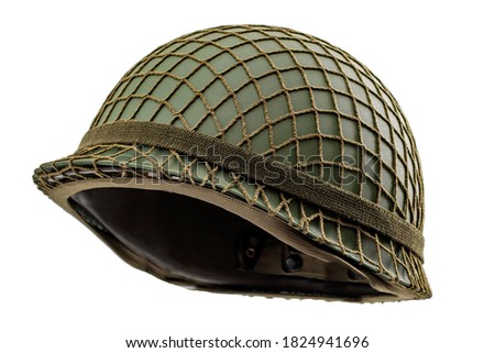 Warfare protective gear and soldier camouflage uniform concept with modern green military helmet isolated on white background with clipping path cutout using the ghost mannequin technique