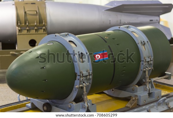 A\
warhead on a transport stand, against a rocket. Weapons of mass\
destruction. Nuclear weapons, chemical weapons, a\
bomb.