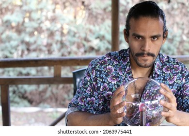 Warlock using crystal ball to read fortune