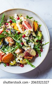 Warm Autumn Quinoa Salad With Baked Vegetables (sweet Potato, Brussels Sprouts), Figs, Feta Cheese And Pomegranate, Top View.