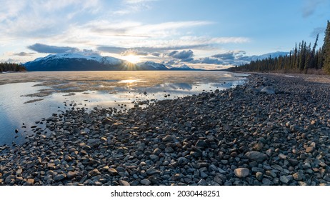 Warm Bay Campground At Sunset In Northern British Columbia During Spring Time With Rocky Lakeshore, Cloudy Blue Sky In Scenic, View Themed Office, Home Art. 