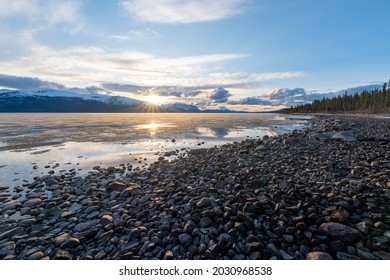 Warm Bay Campground At Sunset In Northern British Columbia During Spring Time With Rocky Lakeshore, Cloudy Blue Sky In Scenic, View Themed Office, Home Art. 