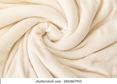 A Warm Blanket Plush Micro Fleece Fabric, Swirled Into A Pattern Background
