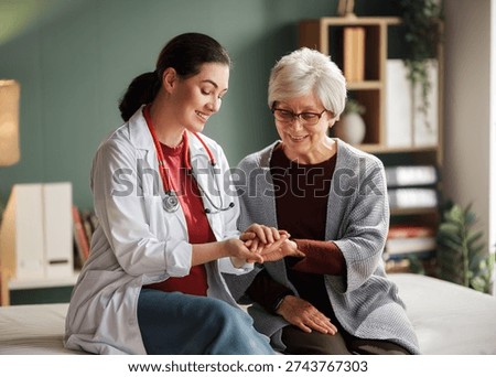 Warm and caring interaction between a doctor and a senior woman in a cozy home setting. Ideal for healthcare, wellness, and elderly care concepts.