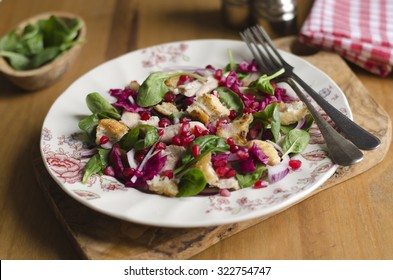 Warm Chicken And Ciabatta Salad With Pomegranate Seeds