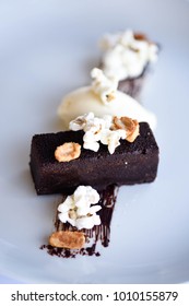 Warm Chocolate Peanut Butter Brownie Served Popcorn And Ice Cream 