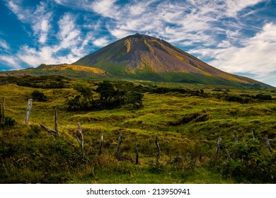 The warm coloured evening sun gracing the volcanic mount Pico on the island of Pico-Azores-Portugal