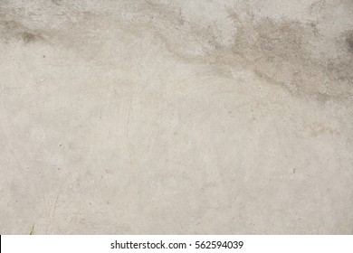 Warm Concrete Texture Photo For Background. Shabby Chic Backdrop. Natural Stone Surface With Drips And Dirt. Distressed Texture In Beige Shades. Obsolete Concrete Floor Top View Photo. Grey Stone