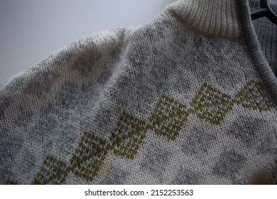 Warm Cozy And Comfort Knitted Wool Sweater With Traditional Norwegian Stich Patterns Fabric And Textile For Cold Winter Days