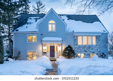 Warm And Cozy Home In Winter Snow