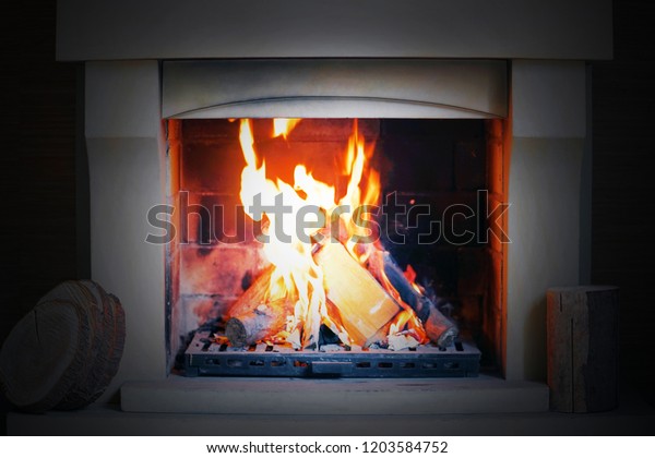 Warm Fire Stone Fireplace On Cold Stock Photo Edit Now 1203584752