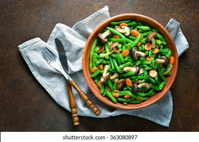 Warm green bean, carrot and mushroom salad, view from above
