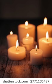 a warm, intimate setting with multiple glowing candles casting a soft, tranquil light on a wooden surface, creating a serene and peaceful ambiance, quiet, simple, evening, rustic, contemplative