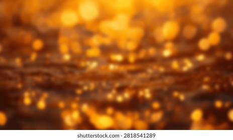 A warm and inviting abstract background featuring numerous golden bokeh lights creating a magical and festive atmosphere.