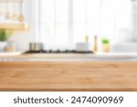 Warm and inviting, this kitchen is the perfect place to cook a delicious meal or entertain guests. The natural wood table is the perfect place to gather around and enjoy a meal.