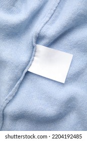 Warm Light Blue Cashmere Sweater With Clothing Label, Closeup