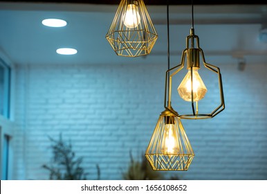 Warm light bulbs in coffee shops,Get and idea concept with copy space.