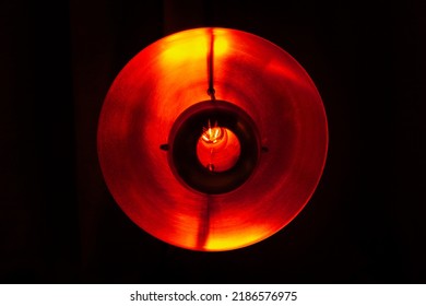 Warm Light At Dark Background . Lamp With Light Reflector . Decorated Electric Lighting With Bulb