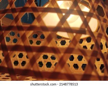 warm light inside a bamboo mesh 