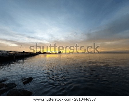 Warm light of Sunset view over Ko Loi island and Sriracha sea