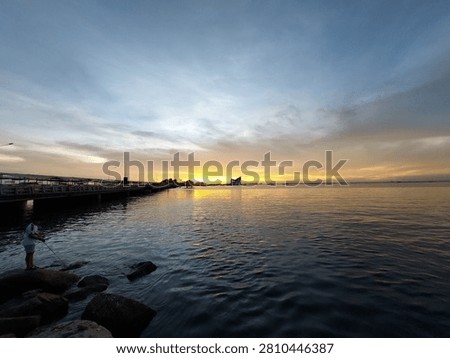 Warm light of Sunset view over Ko Loi island and Sriracha sea