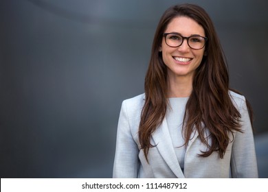 Warm Likable Commercial Friendly Portrait Of A Smart Beautiful Natural Woman, Business Executive Person