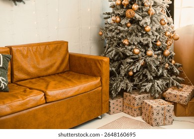The warm living room has a comfy leather sofa, a decorated Christmas tree with shining ornaments, and wrapped gifts, creating a perfect ambiance for joyful holiday celebrations