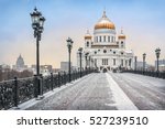 Warm mood of a cold winter on the Patriarchal bridge in Moscow near Christ the Savior Cathedral