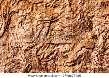 Warm o,cher and brown rustic stone wall texture abstract background.