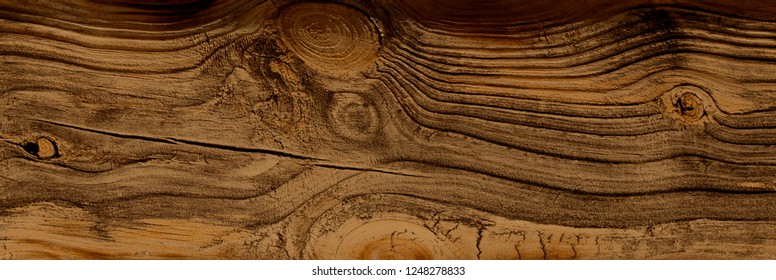 Warm Orange And Red Brown Reclaimed Wood Surface With Aged Boards Lined Up. Wooden Planks On A Wall Or Floor With Grain And Texture. Neutral Stained Vintage Wood Background.