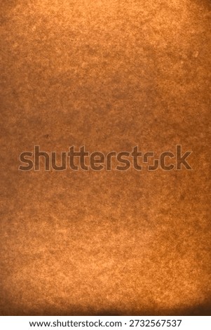 Warm orange textured background with soft grain and light falloff. Perfect for overlays, posters, branding, artistic compositions and creative visual projects.