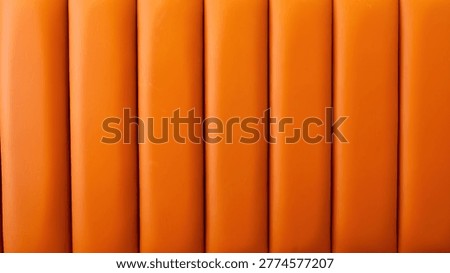 Warm orange vertical fluted panel texture background