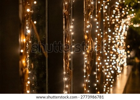 Warm String Lights on Railing with Bokeh Background – Night Festive Glow, Copy Space