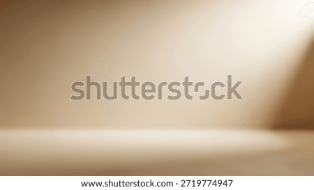 Warm studio spotlight illuminates subtle textured background.