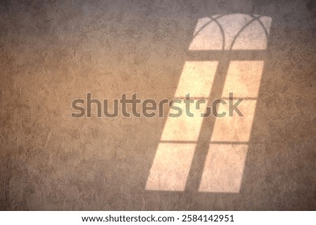 Warm sunlight casts a soft shadow of an arched window on a textured wall, creating a peaceful, minimalist atmosphere. Ideal for backgrounds, design elements, and creative compositions.