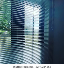 Warm sunlight wafting through the window - Shutterstock ID 2341784655