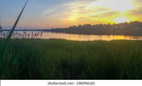 Warm Sunrise Overlooking Meadows In Manhasset Bay Long Island, New York