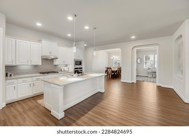 a warm and welcoming white kitchen  - Shutterstock ID 2284824695
