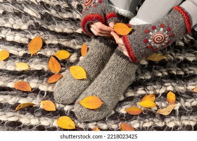 Warm Woolen Clothes. Close-up Of Warm Mittens And Socks.